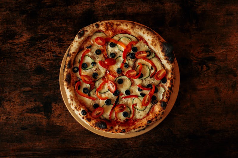 Four cheese pizza with melted mozzarella, gorgonzola and parmesan